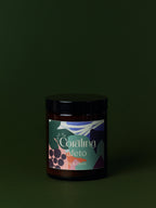 Jar with a colorful label on a dark background