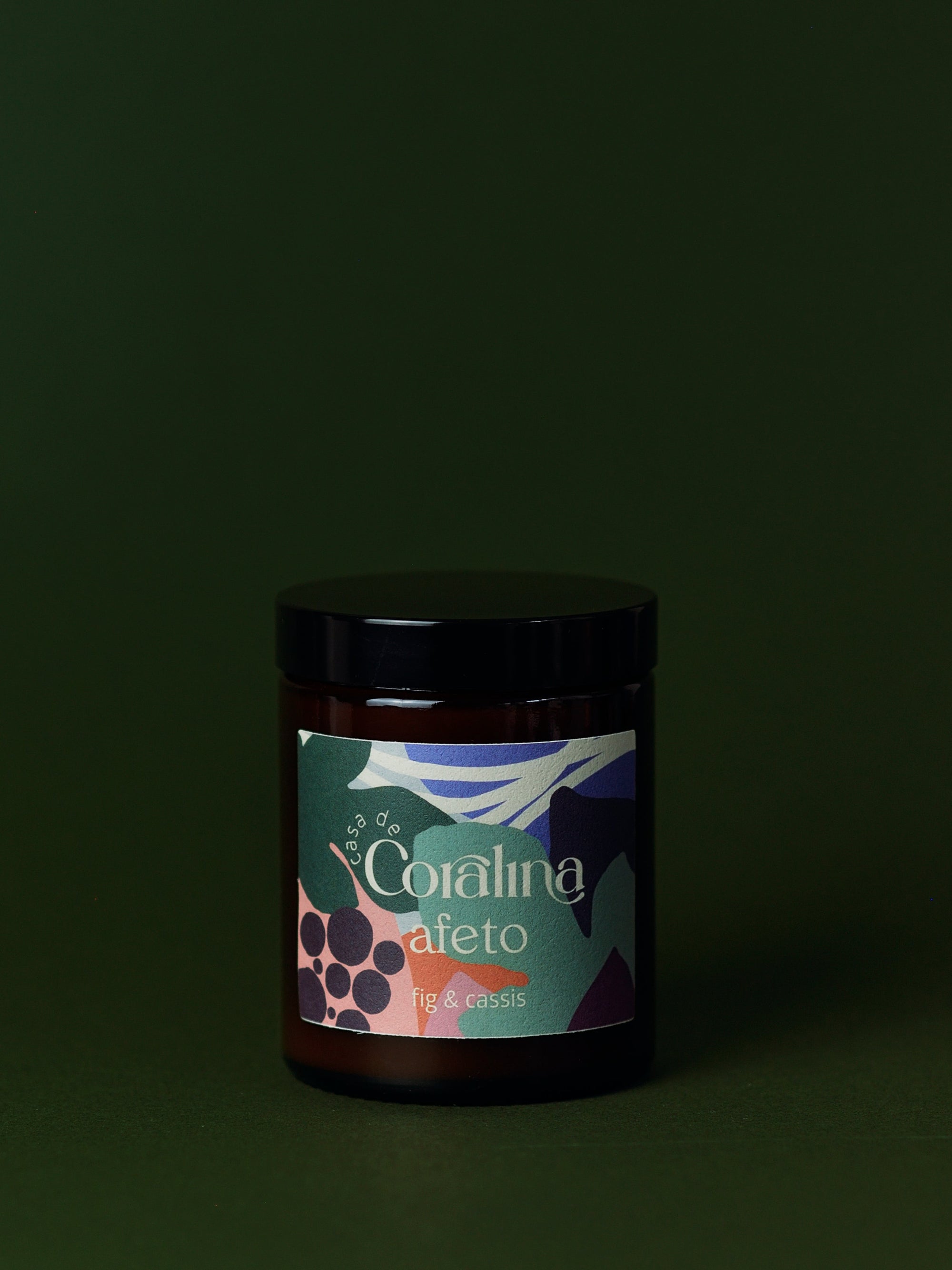 Jar with a colorful label on a dark background
